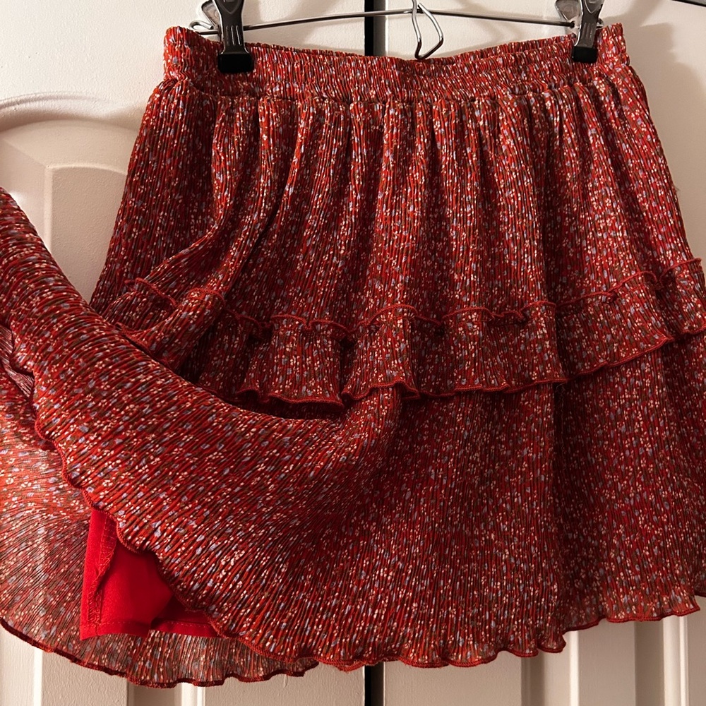Orange flowy mini skirt